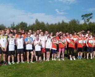 Young athletes from Harmeny and Corstorphine clubs after the races at Curriemuirend Park on 28 September